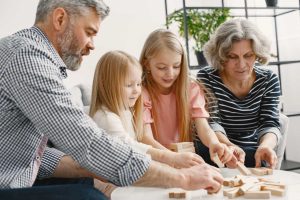 Children support their grandparents who have symptoms of silent migraine.